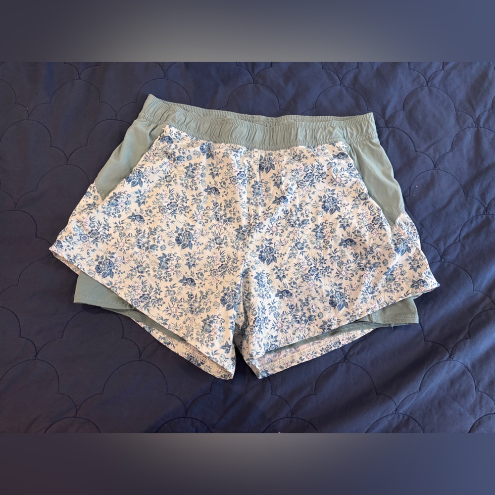 Teal floral Fair Harbor Corliss shorts with bike shorts liner